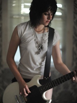 Kristen Stewart as Joan Jett in The Runaways