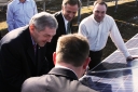 Tennessee State Governor Haslam and TVA President Tom Kilgore Installing the last Solar PV panel Image