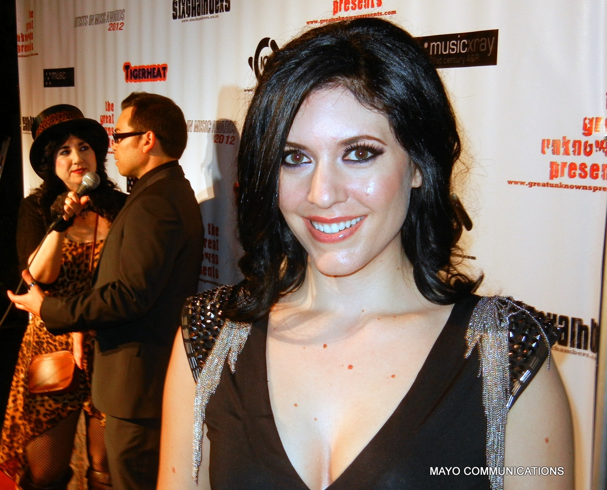 2012 "Best Artist" with "Best Pop Song" nominee Kristen Faulconer on the red carpet. Image