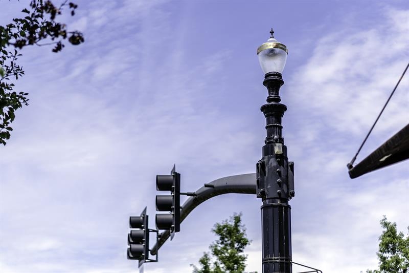 Ornamental traffic signal pole, arm and light fitting Image