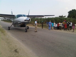 Aircraft Landing on a Road Near Leogane, Haiti to Deliver Food, Supplies and Doctors