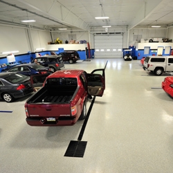 Honda Dealership Gets Industrial Flooring from Versatile Building Products & Garage Experts