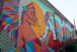 Local Developer Turns Burned Building Into 120-Foot Art Mural for the City of Nacogdoches