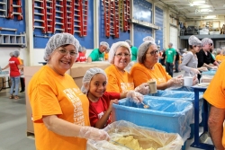 J.C. Restoration Volunteers Succeed in Packing Over 100,000 Life-Saving Meals