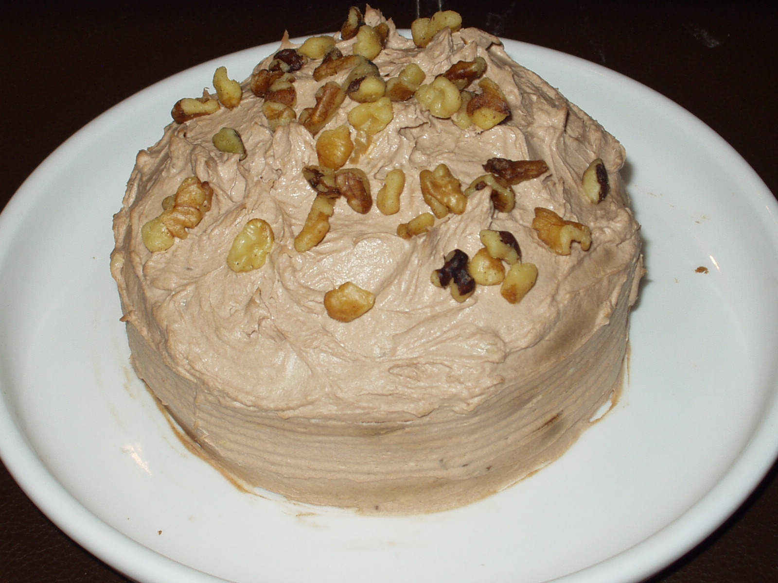 Carob-Banana-Peanut Butter Double Layer Cake with Carob-Cream Cheese and Walnut Frostin Image