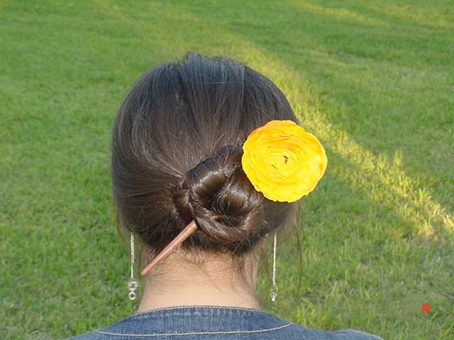 Bella Hair Stick with a Sun Yellow Bella Topper Image