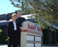 Mary and Lyle in Front of Corporate Office Image