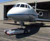 A Towbarless Remote Controlled Electric Aircraft Tug System Capable of Towing Very Large Business Jets in Challenging Conditions