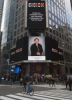 Julia L. Reynolds Showcased on the Reuters Billboard in Times Square in New York City by Strathmore's Who's Who Worldwide Publication