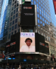 Michele Briscoe Honored as a Woman of the Month and on the Reuters Billboard in Times Square by P.O.W.E.R. (Professional Organization of Women of Excellence Recognized)