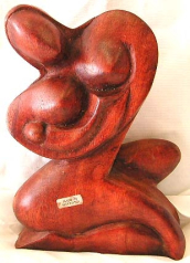 Online gift idea - naked woman holding baby abstract carving stand