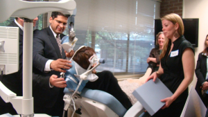 Dr. Perera performs TMS on Carole Wilder-Tamme