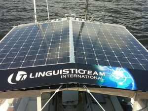 Solar Panel roof (mounted atop the bimini) sporting the LTI banner on the forward roof panel, and "IT MAKES SENSE." on the aft.