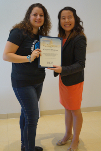 Crystal Paxton, leading fundraiser at Linden Optometry A P.C. Accepts Certificate of Congressional Achievement