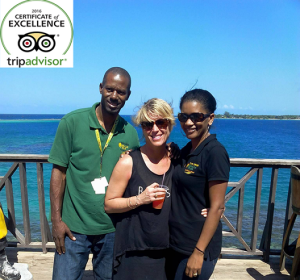 Andrea and Garnet Foster (Co-Owners of Travel Around Jamaica Tours) with customer at Discovery Bay, Jamaica.