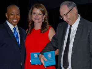 Brooklyn Borough President Eric Adams presents BCS Corporate Leadership Award