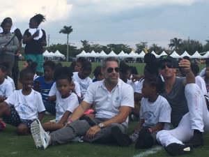 Members of the Boys & Girls Club of Wellington enjoying time on the playing field before the 3:00PM Piaget Gold Cup Match.
