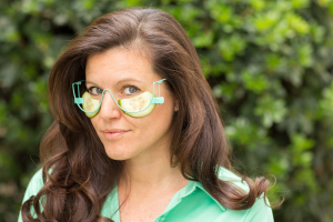 MoisturEyes creator Dr. Blythe Metz sporting her cucumber fresh beauty accessory