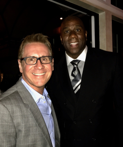 Earvin "Magic" Johnson with John P. Roberts, guest of Chauncey Lufkin