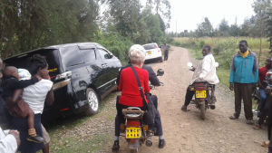 Mama Sandy Mulcahy took a ride on a boda boda (moped) to a primary school in Kapkesembe