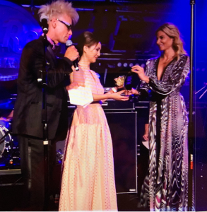 Lily Lisa receives award on stage