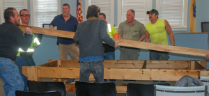 Ridgefield Park Department of Public Works employees assemble table
