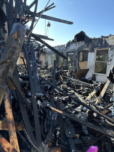 Fire destroyed the original Woods Fort Golf Clubhouse.