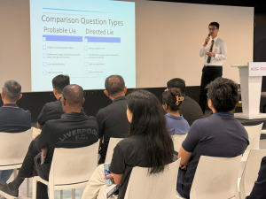 Allen giving his presentation on his field study