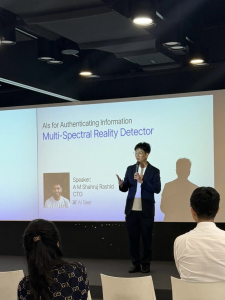 Dennis introducing AI Seer and the speakers to the audience