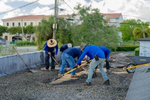 Greener Roofing Team Working on the new Be Strong International Roofing