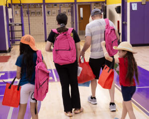 Families receive free backpacks courtesy of Style Saves