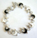 Multi enamel black and white color dolphin pattern forming fashion bracelet, with toggle jewelry cla