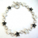 Fashion bracelet in multi enamel black and white star face pattern design, with toggle jewelry clasp