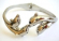 Fashion bangle bracelet with 4 kiss dolphin family pattern