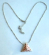 Fashion necklace with beaded chain holding a multi mini red cz embedded pyramid shape metal pendant