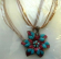 Multi brown strings fashion necklace with chain-in triple purple color triangle pendant at center