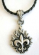 Fashion necklace with black twisted imitation leather string holding a mystic flaming metal pendant