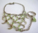 Fashion slave bracelet with multi diamond shape green rhinestones embedded and multi silvery moons o