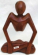 Unique home decor - abstract yogi man in yoga sitting position with two hands holding its knee, midd