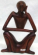 Comteporary craft work -abstract yogi man in sitting position with one hand cross on knee and one ha