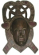 Indonesia gift art - black mad man face wooden mask with tribal man figure sitting on top