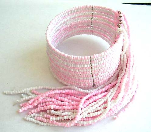 Fashion bracelet bangle in multi pink and white beaded strings design with multi beaded string dangl
