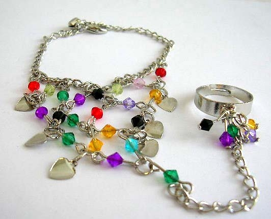 Fashion slave bracelet with multi diamond shape assorted color rhinestones embedded and multi silver