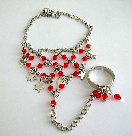 Fashion slave bracelet with multi diamond shape red rhinestones embedded and multi silvery star patt