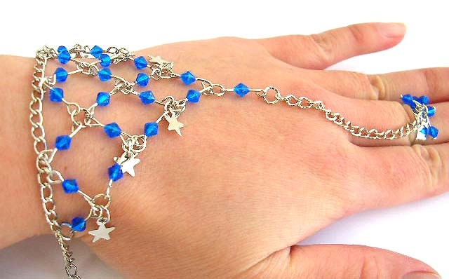 Fashion slave bracelet with multi diamond shape dark blue rhinestones embedded and multi silvery sta